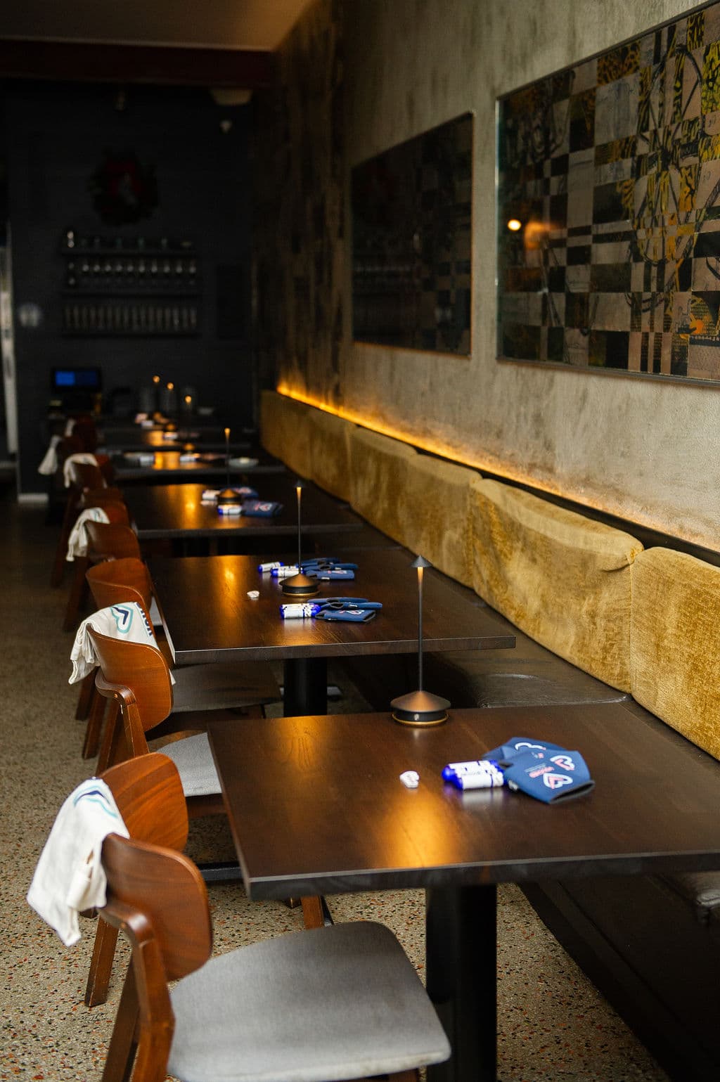 People gathered at tables during a Vouched event